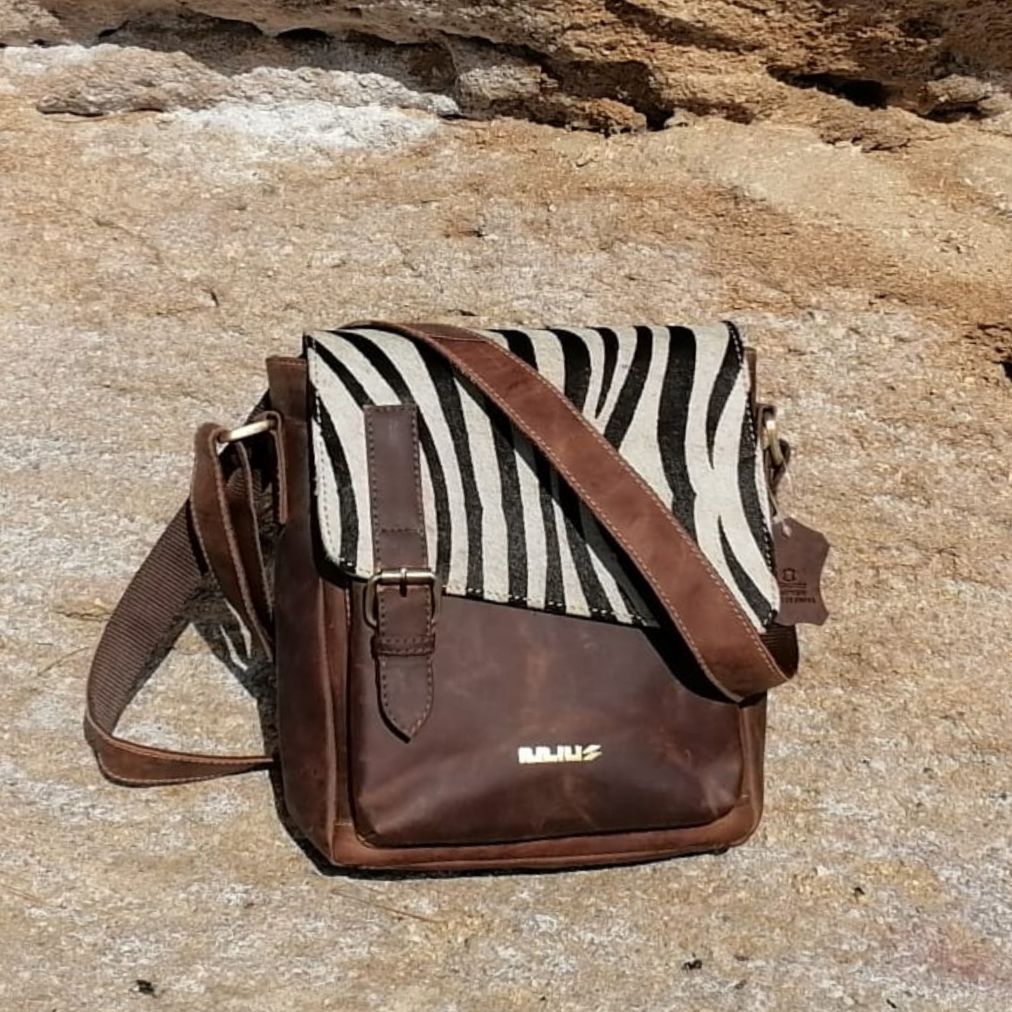 IULIUS Bandolera Unisex de Piel con Solapa Cebra